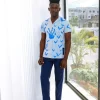 A White And Blue Mixed Hand Pattern Paint Stripe Shirt.