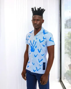 A White And Blue Mixed Hand Pattern Paint Stripe Shirt.