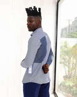 A White And Blue Mixed Stripe Shirt.