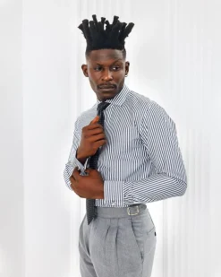 A White and blue stripe, cut-away collar business shirt.