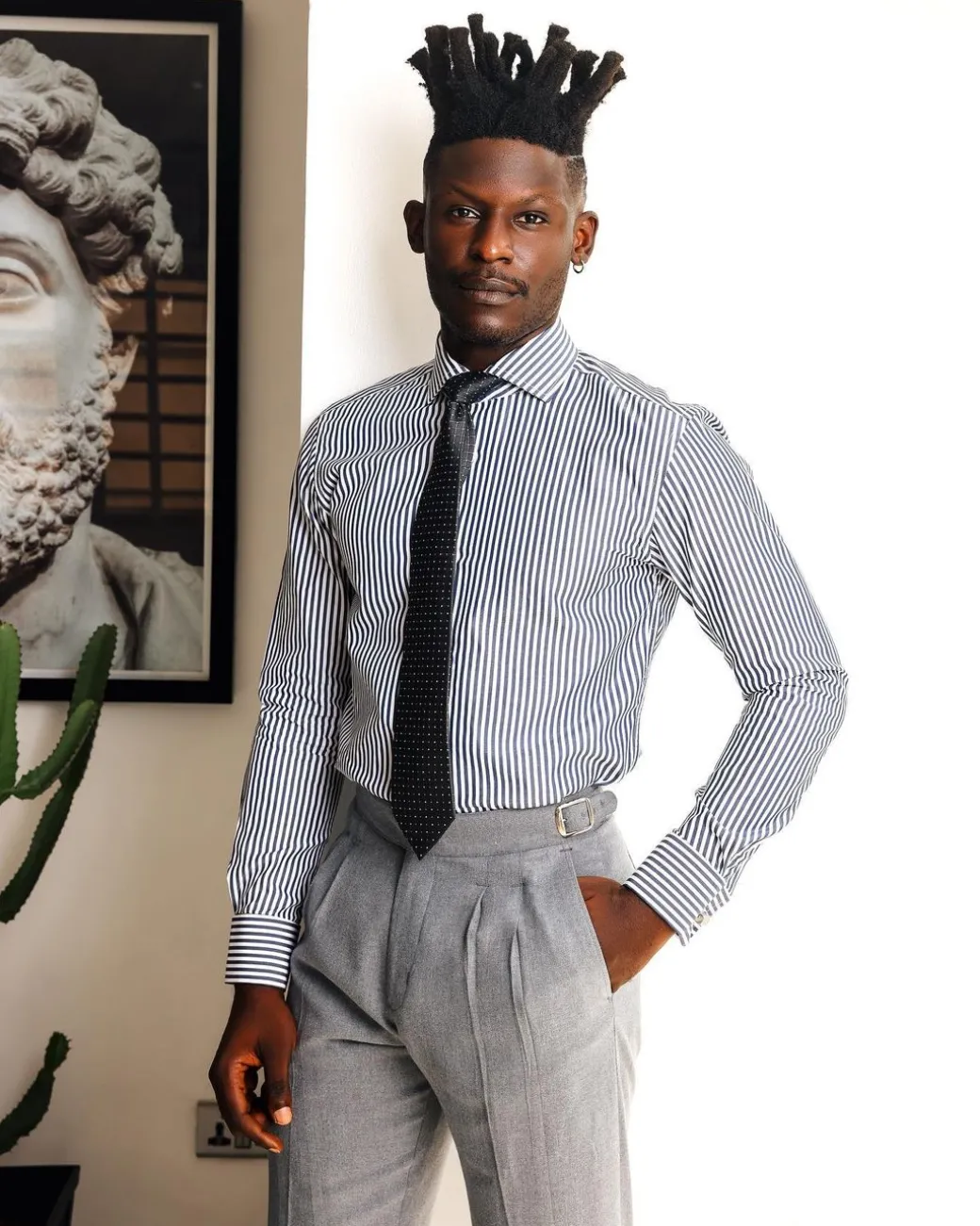 A White and blue stripe, cut-away collar business shirt.