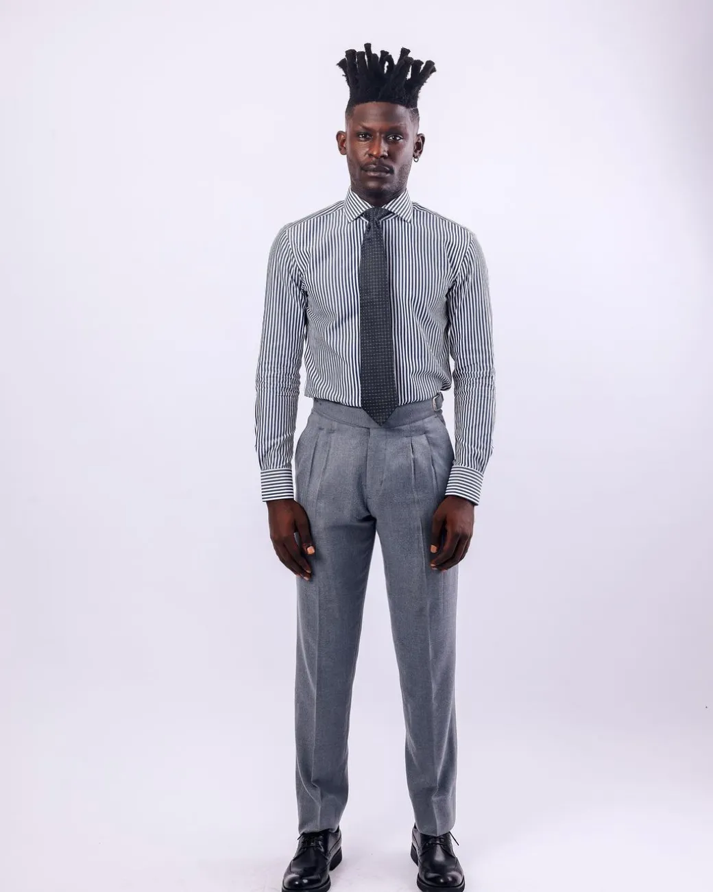 A White and blue stripe, cut-away collar business shirt.