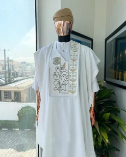 A white, connected faces renaissance maze embroidery details agbada