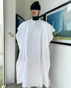 A white, connected square embroidery design with matching silver and black Swarovski stone details agbada