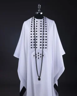 A White, Connected Square Embroidery Design With Matching Black And Silver Swarovski Stone Details Agbada