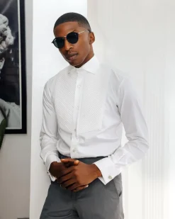 A White, Cut-Away Pleated Evening Tuxedo Shirt.