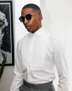 A White, Cut-Away Pleated Evening Tuxedo Shirt.