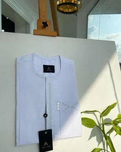 A white, dotted and covered square embroidery detailing african traditional senator kaftan native.