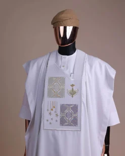 A white, dripping stars and interconnected maze embroidery details agbada