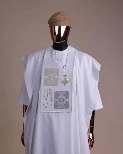 A white, dripping stars and interconnected maze embroidery details agbada
