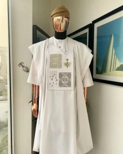 A white, dripping stars and interconnected maze embroidery details agbada