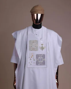 A white, dripping stars and interconnected maze embroidery details agbada