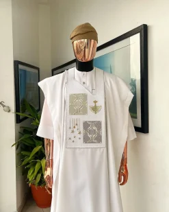 A white, dripping stars and interconnected maze embroidery details agbada