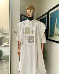 A white, dripping stars and interconnected maze embroidery details agbada