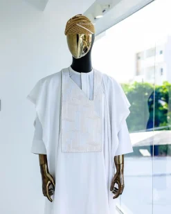 A White, dropping maze line embroidery details agbada, 3/4 sleeve kaftan, and Sokoto