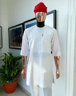 A White, front flap, triple ruffle pocket design & Swarovski button details african traditional senator kaftan native.