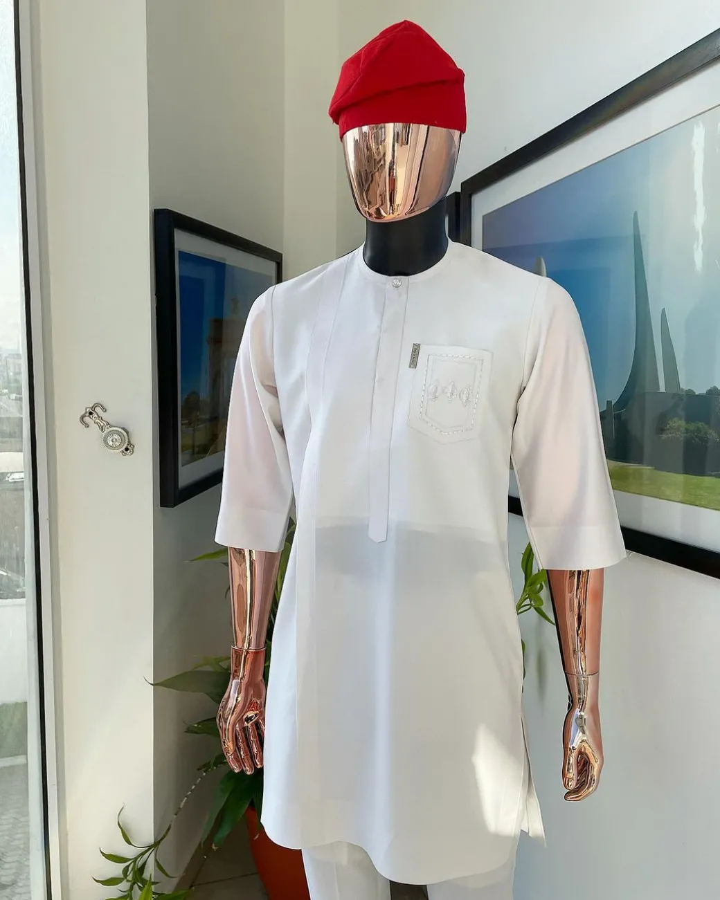 A White, front flap, triple ruffle pocket design & Swarovski button details african traditional senator kaftan native.