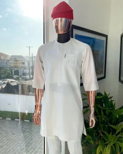 A White, front flap, triple ruffle pocket design & Swarovski button details african traditional senator kaftan native.