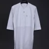 A white, front flap with mixed Swarovski button,3/4 sleeve with velvet cuff details African senator kaftan Native.