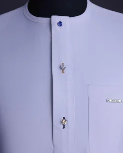 A White, front flap with mixed Swarovski buttons, patch pocket, free hand cuff with (keep walking) embroidery detailing African senator kaftan native.