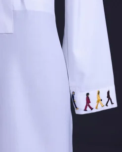 A White, front flap with mixed Swarovski buttons, patch pocket, free hand cuff with (keep walking) embroidery detailing African senator kaftan native.