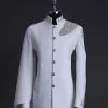 A white, hand “ide” silver metal wire embroidery, right hand sache safari suit