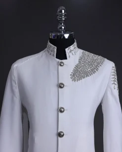 A white, hand “ide” silver metal wire embroidery, right hand sache safari suit