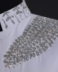 A white, hand “ide” silver metal wire embroidery, right hand sache safari suit
