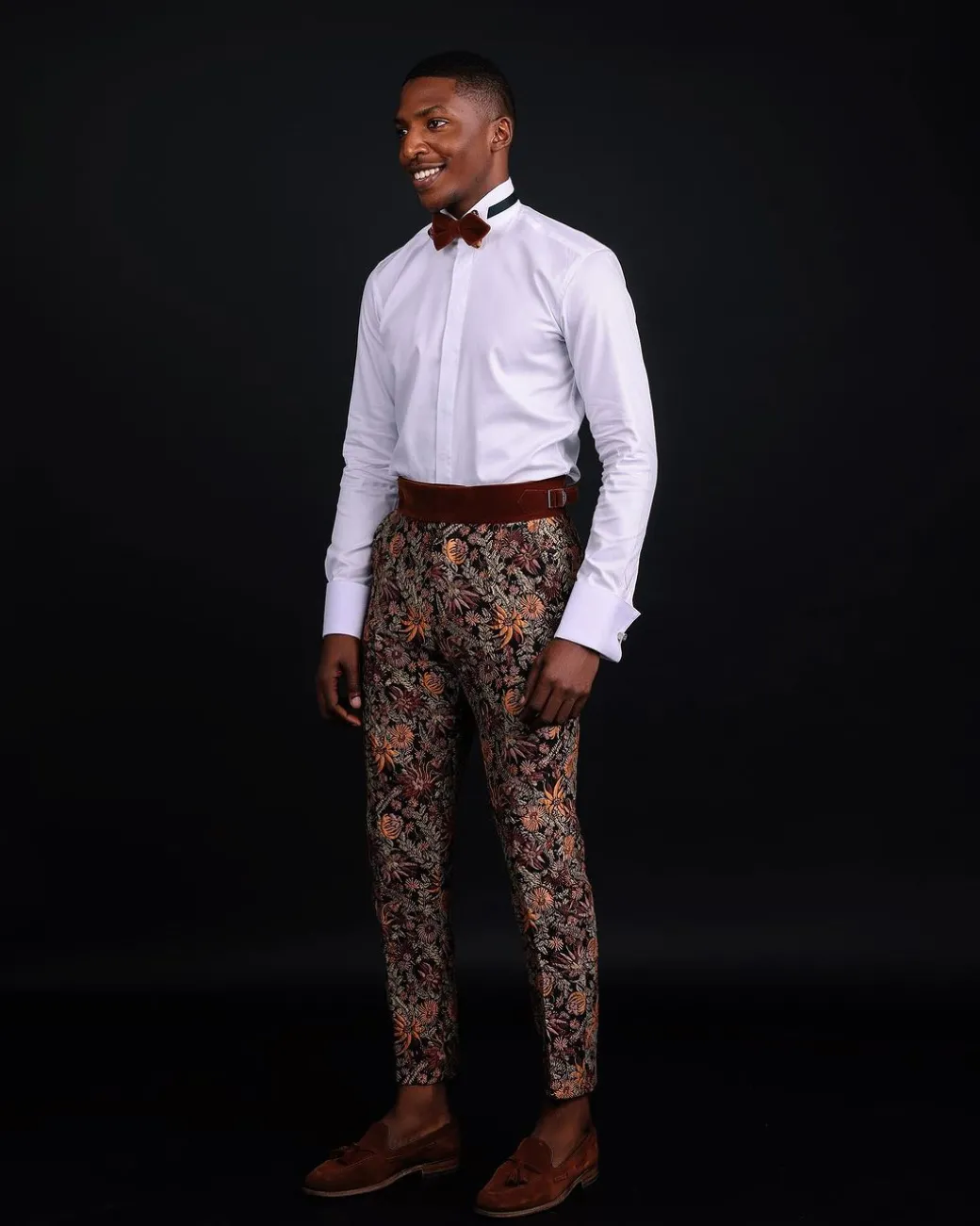 A White Invisible Stripe, Double Cuff, Wing Collar Shirt With High Waist Gurkha Pant Trouser.