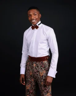 A White Invisible Stripe, Double Cuff, Wing Collar Shirt With High Waist Gurkha Pant Trouser.