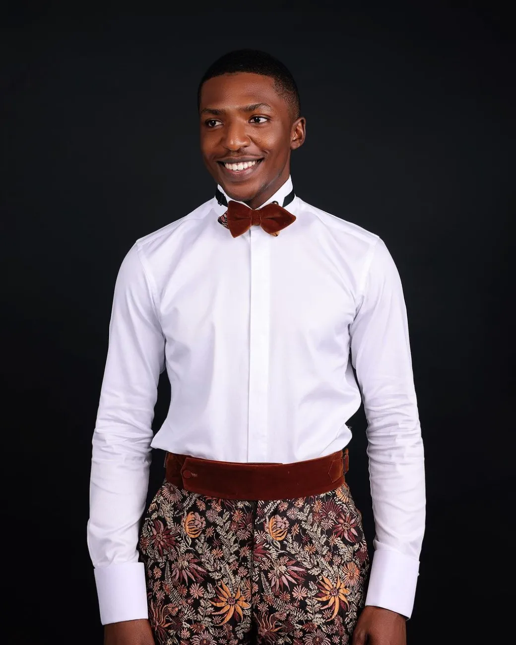 A White Invisible Stripe, Double Cuff, Wing Collar Shirt With High Waist Gurkha Pant Trouser.