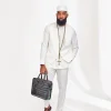 A White Kaftan, White Jacquard Jacket and Matching Hat