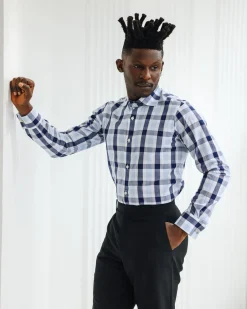 A White, navy & sky blue windowpane check English spread collar shirt.
