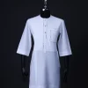 A White, paisley details, front flap with Swarovski buttons, patch pocket, 3/4 sleeve African senator kaftan native.