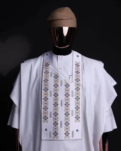 A white, shattered interwoven embroidery with Swarovski stones details agbada