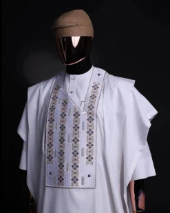 A white, shattered interwoven embroidery with Swarovski stones details agbada