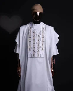 A white, shattered interwoven embroidery with Swarovski stones details agbada