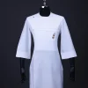 A White T shaped line with Swarovski buttons, leaf embroidery patch pocket, 3/4 sleeve African senator kaftan native.