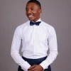 A White, Tuxedo Shirt With Dotted Front Details.