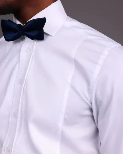 A White, Tuxedo Shirt With Dotted Front Details.