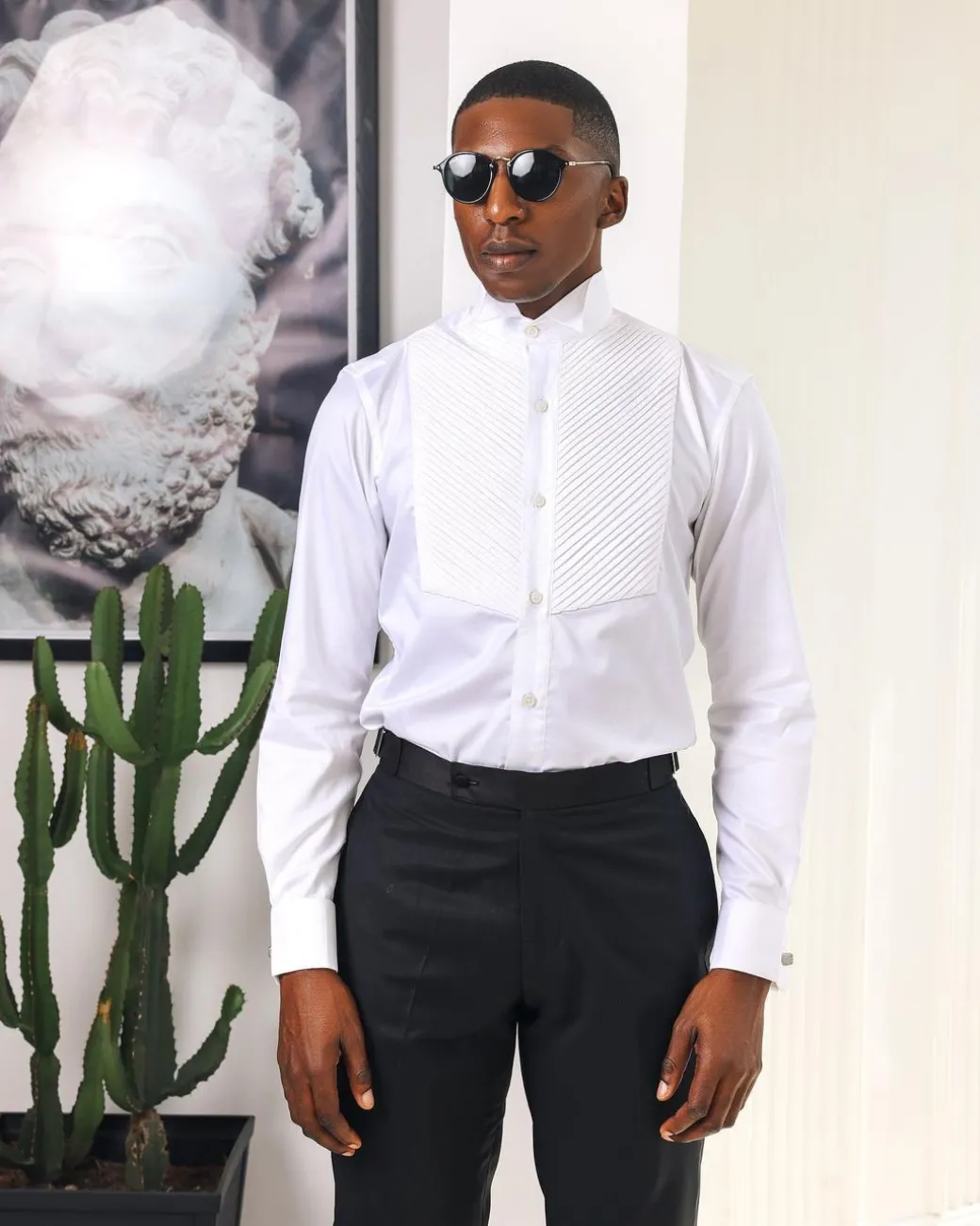 A White, wing collar, pleated evening tuxedo shirt