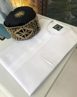 A White with a front-flap traditional African Kaftan and sokoto