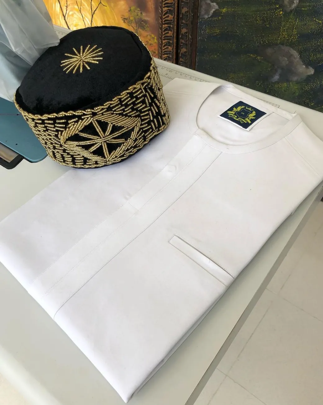 A White with a front-flap traditional African Kaftan and sokoto
