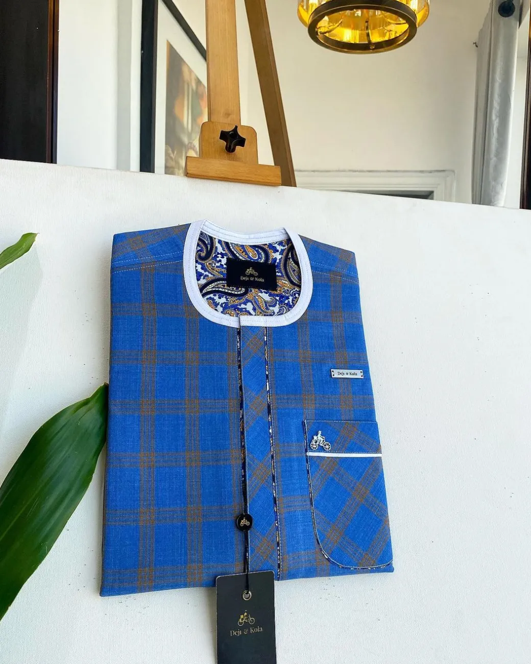 A window pane check, Front Flap, Curved Patch pocket details African traditional senator kaftan native.