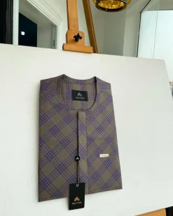 A windowpane tortilla brown with orange and navy blue stripes, a front flap detailing African traditional senator kaftan native.