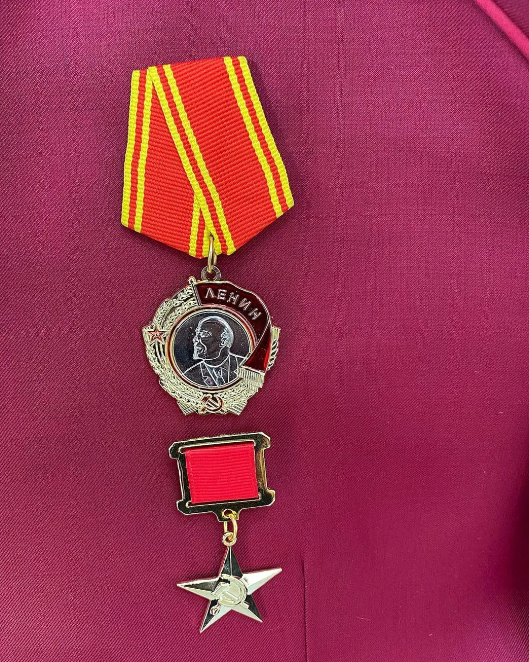 A Wine reloaded “7th Battalion” tuxedo Suit with gold adornment