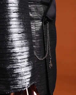 A wire metallic silver and black jacquard, lower cut, wrap shawl lapel tuxedo suit