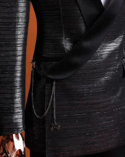 A wire metallic silver and black jacquard, lower cut, wrap shawl lapel tuxedo suit