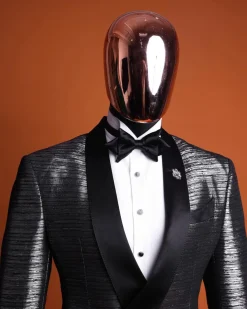 A wire metallic silver and black jacquard, lower cut, wrap shawl lapel tuxedo suit