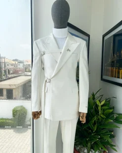 A wrap and strapped ivory white, peak lapel suit